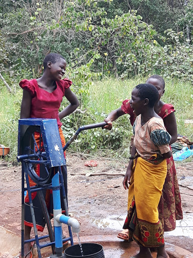 New hand drilled community water pump